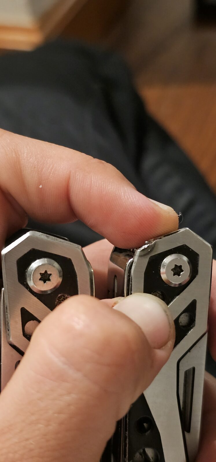 Lyn's well-used DRFRIEDELS Multi-Tool, in hand after two years of marine-mechanic work